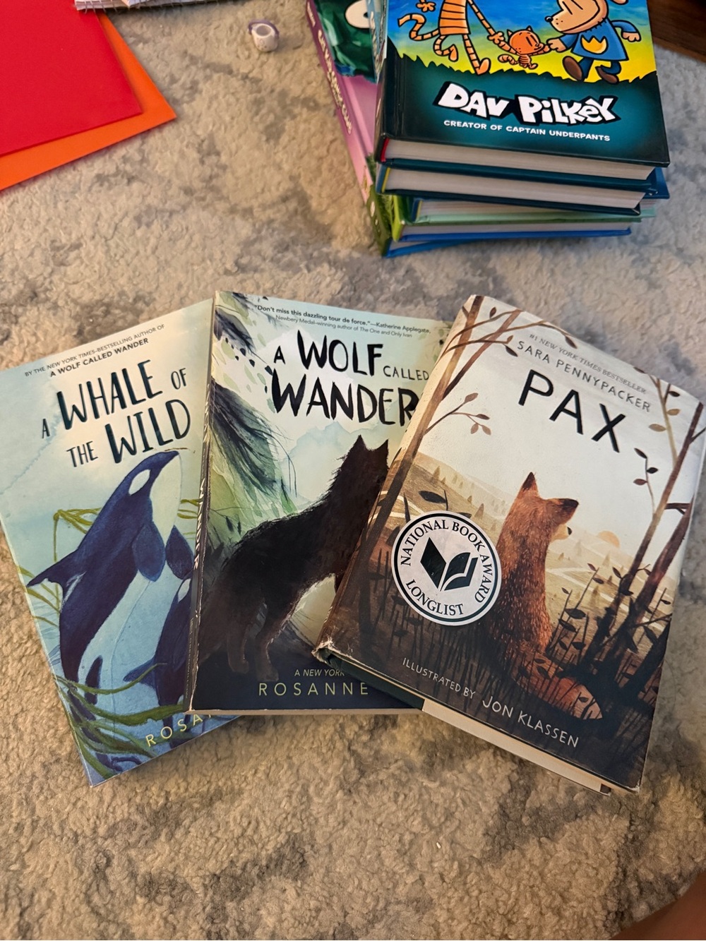 3 books - Pax, a wolf called wonder, and a whale of the wild.